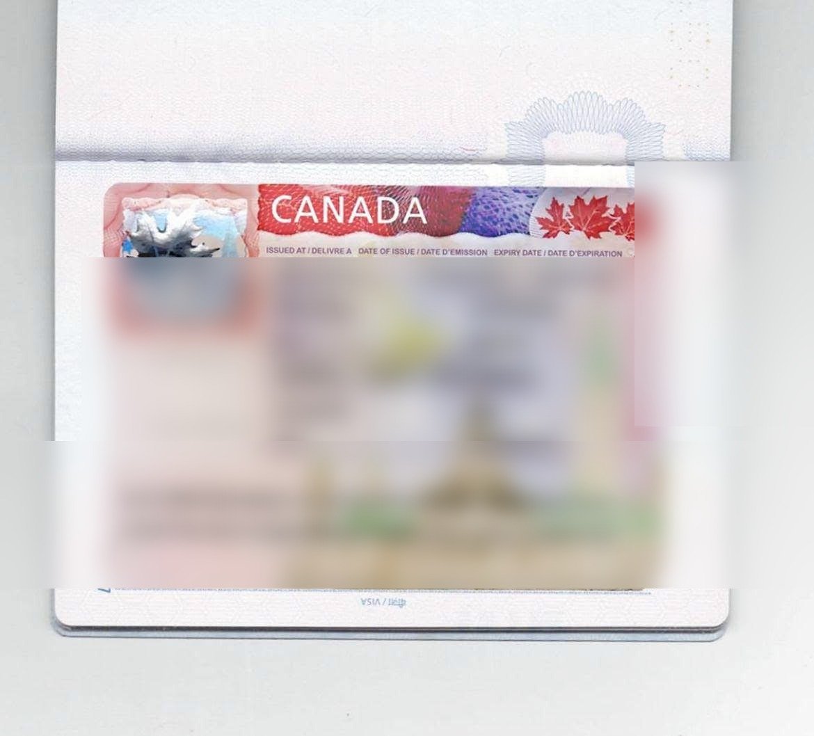 Approved Work Permit for Canada, personal details blurred